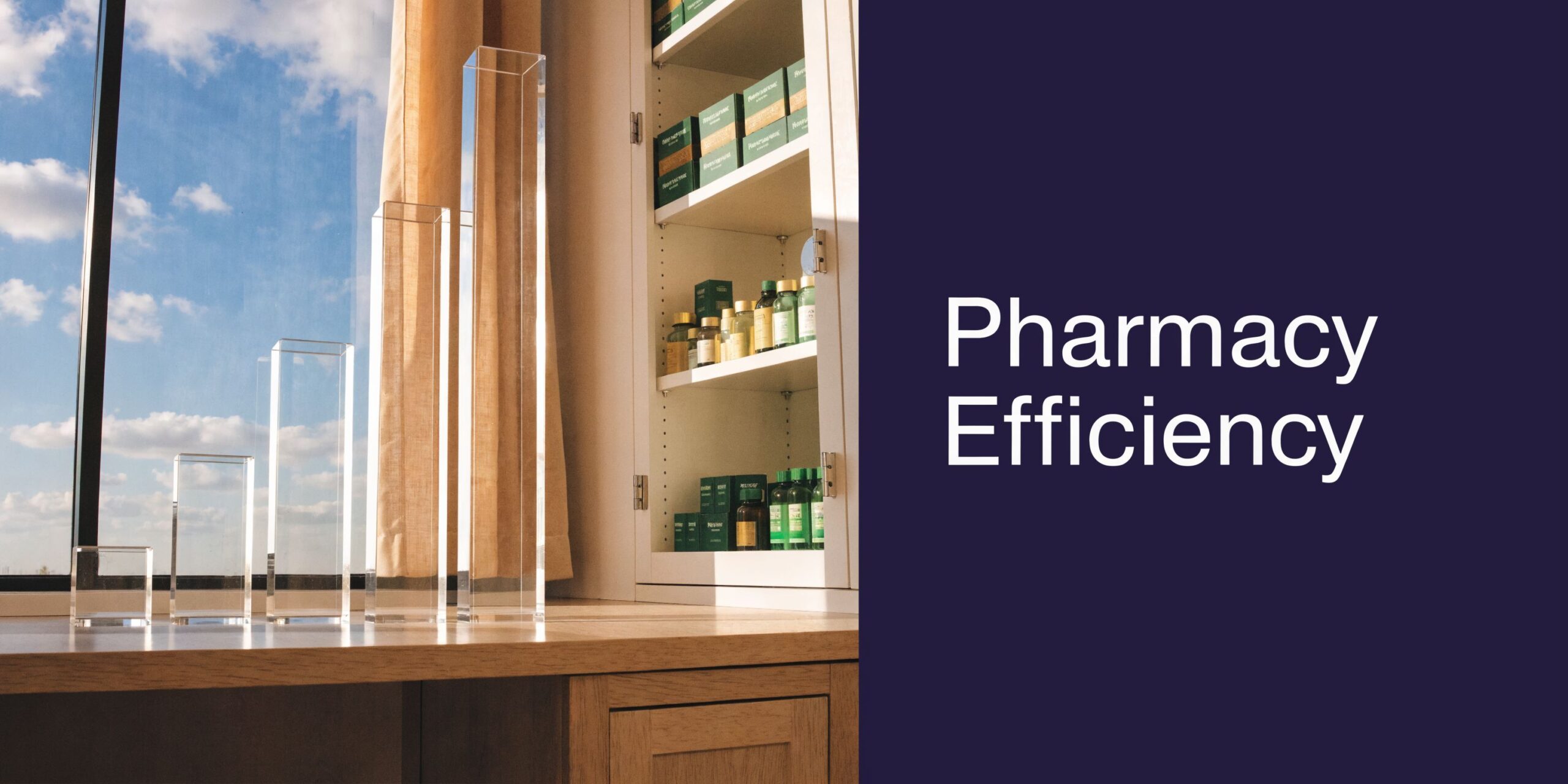 A professional pharmacy display showing clear rising pillars on a wooden desk next to medicine shelves.