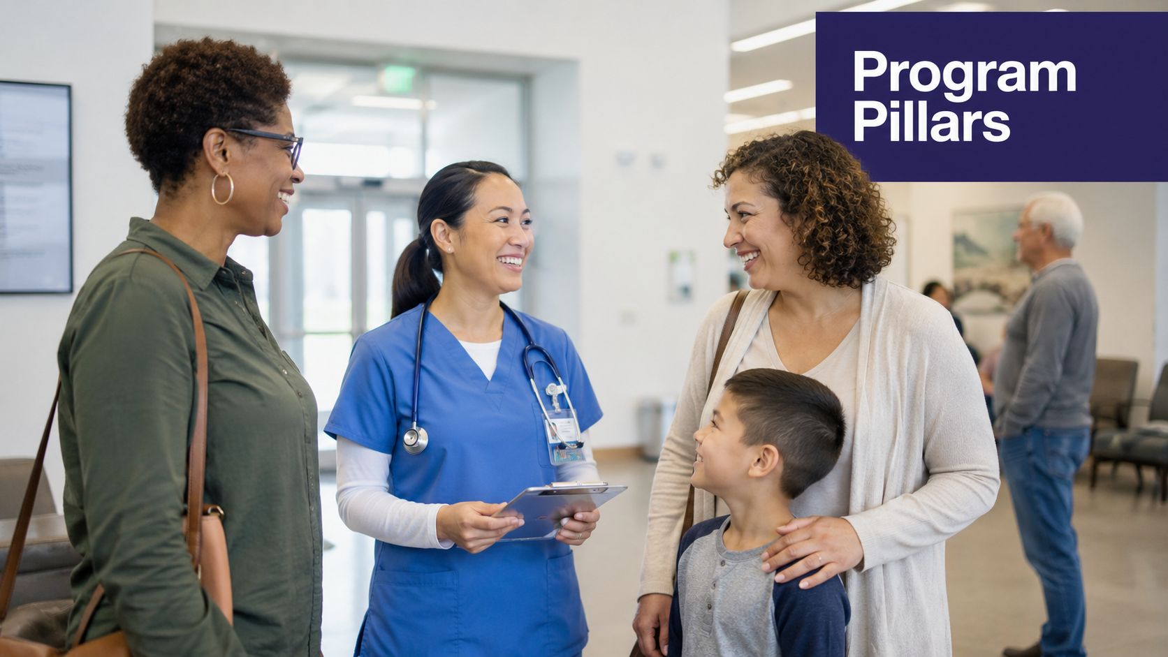 A friendly nurse speaking with a mother and her young son in a hospital waiting area.